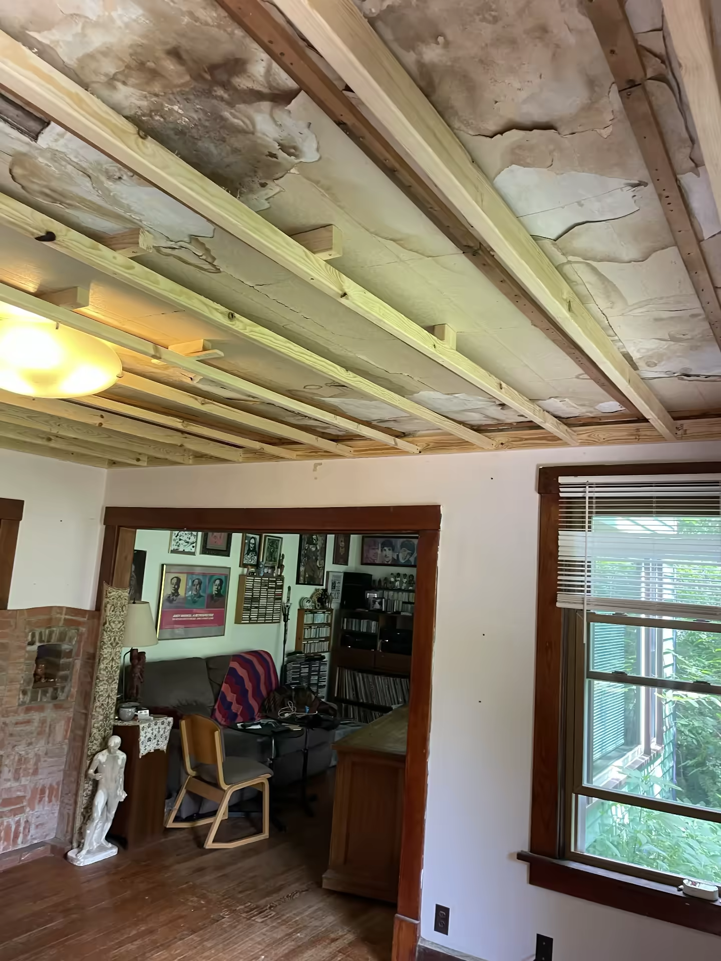 Ceiling repair — new joists sistered to old lath and plaster