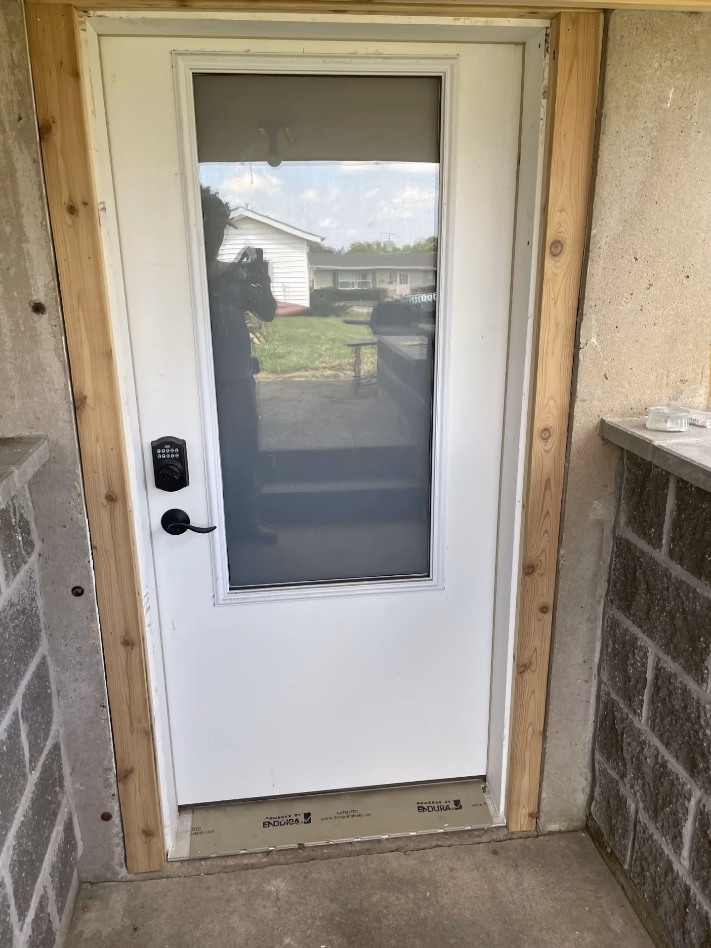 Exterior door installation with keypad deadbolt