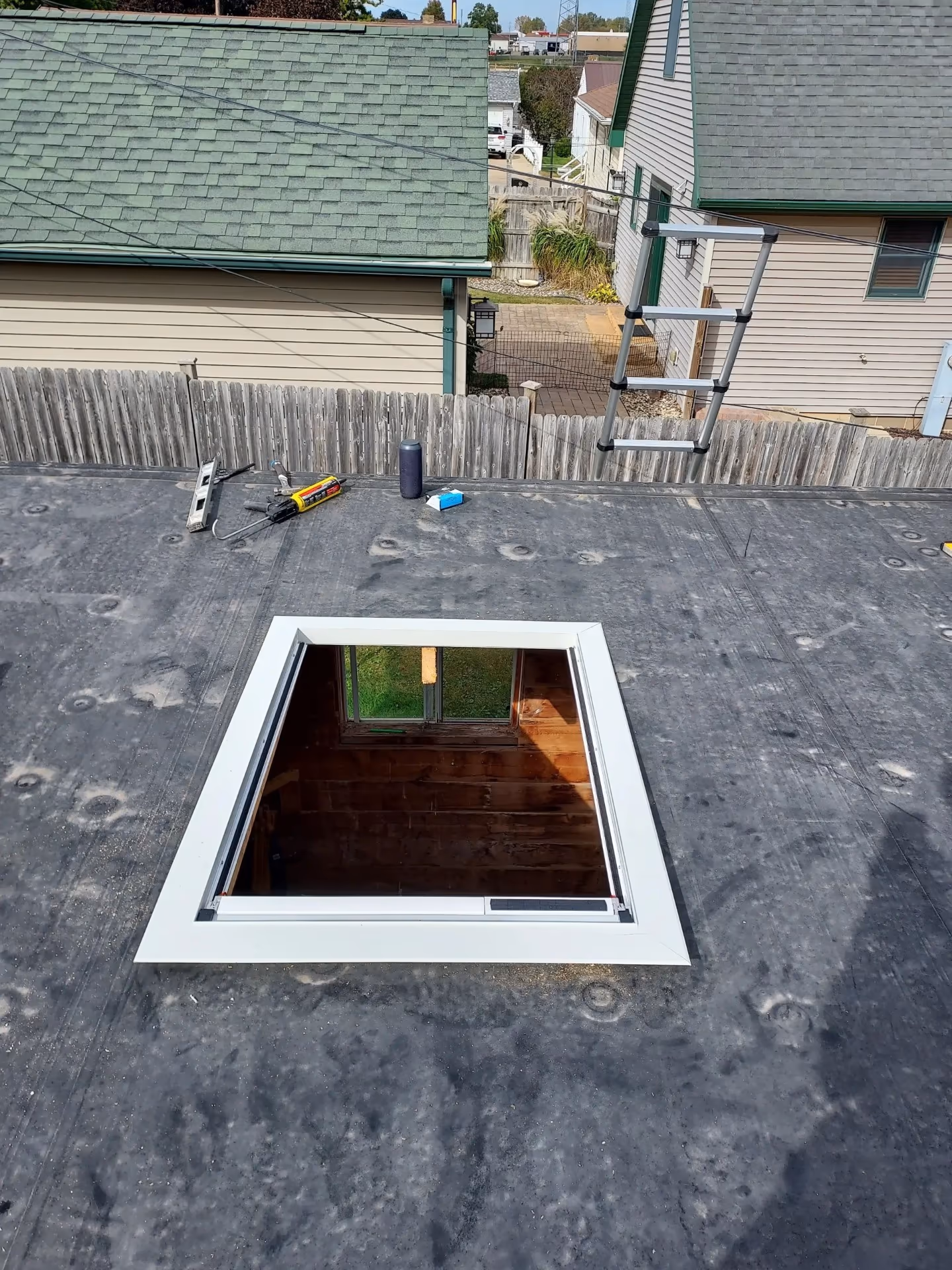 Skylight replacement on flat rubber roof